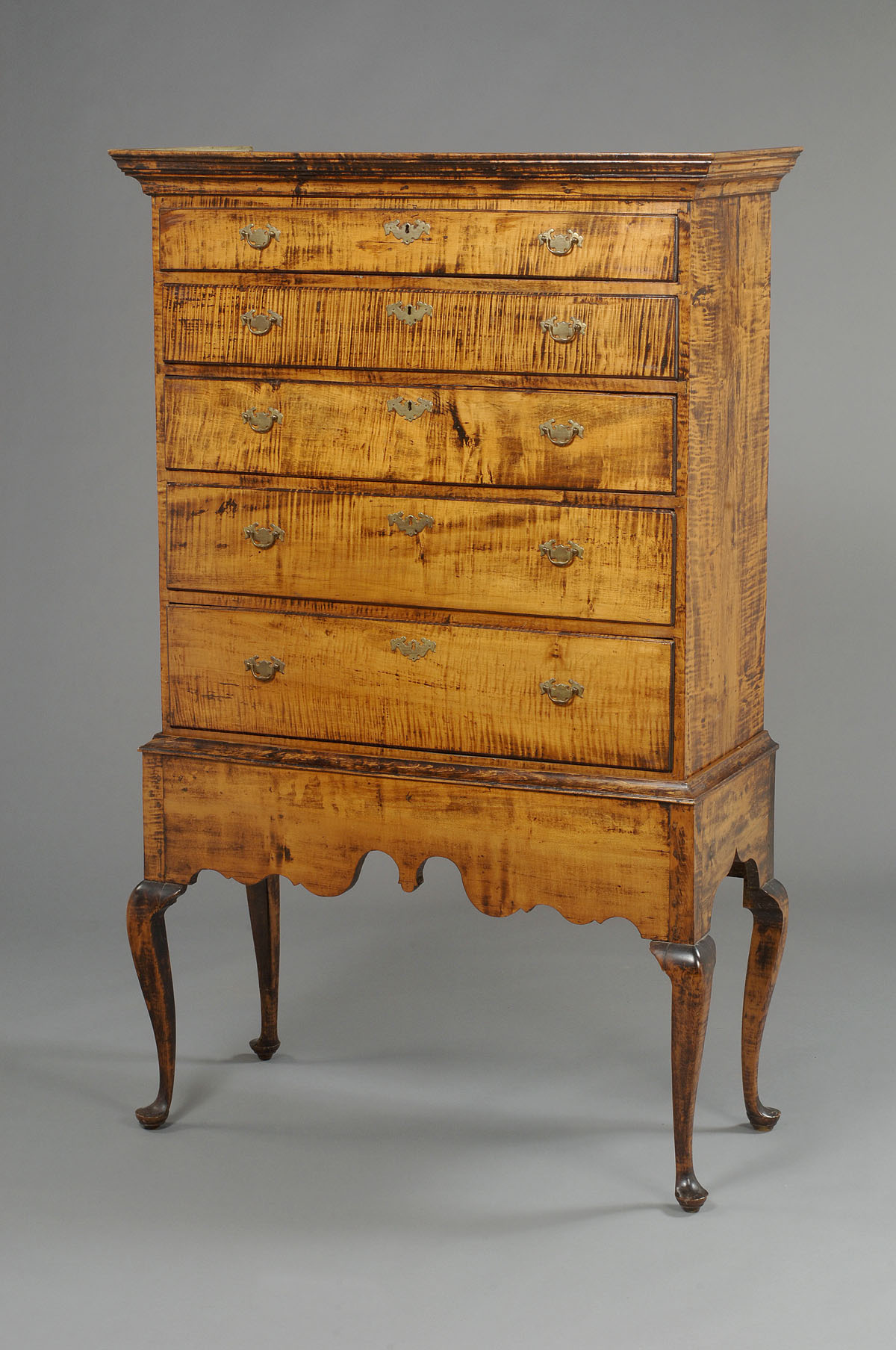 Appraisal: NEW ENGLAND QUEEN ANNE TIGER MAPLE HIGH CHEST ON FRAME