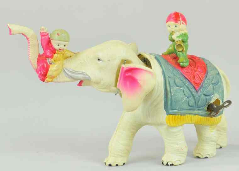 Appraisal: ELEPHANT AND TWO CHILD CLOWN RIDERS Japan colorful celluloid toy