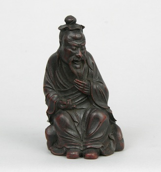 Appraisal: A Chinese Bamboo Carved Figure of Confucius A Chinese carved