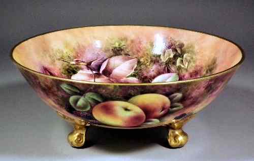 Appraisal: A Coalport bone china bowl standing on three feet painted