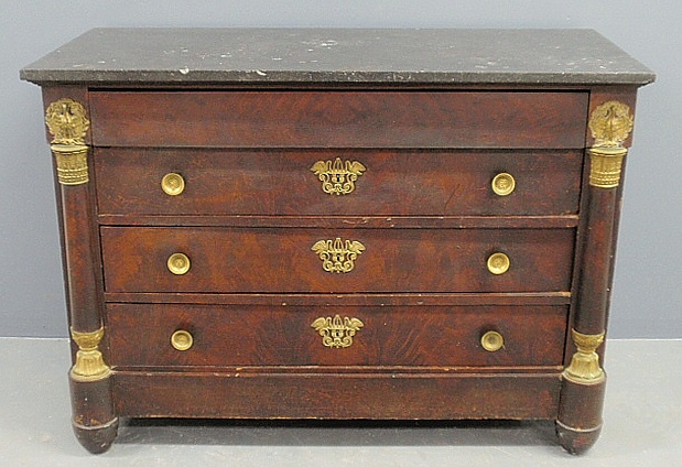 Appraisal: - Louis XVI style mahogany chest of drawers with a