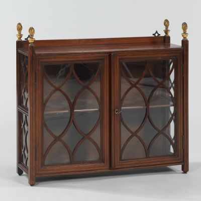 Appraisal: A Wall Mount Walnut Display Cabinet Double door cabinet with