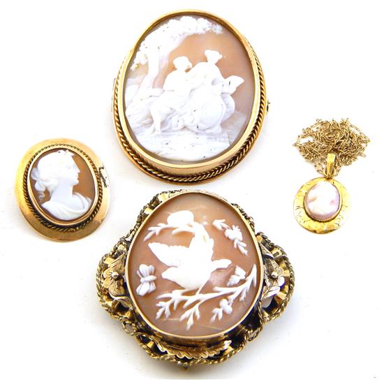 Appraisal: JEWELRY Four carved shell cameo pieces all tested yellow gold