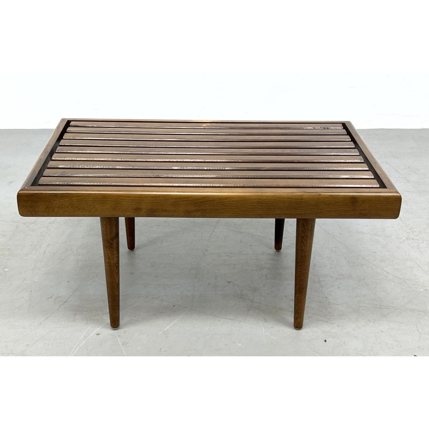 Appraisal: Small Slat Bench Coffee Table Modernist peg legs Dimensions H