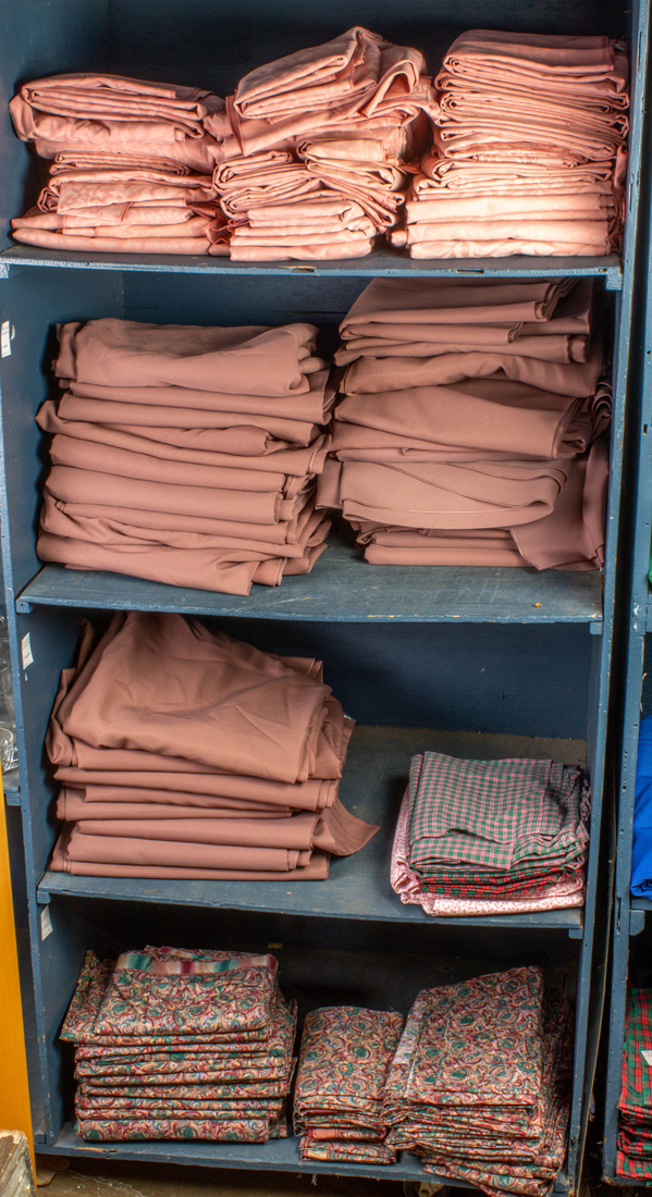 Appraisal: Four shelves of table linens including pink damask paisley print