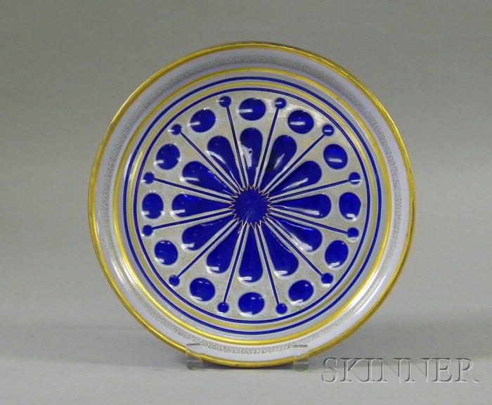 Appraisal: White over Blue Overlay Glass Charger with gilt decoration and