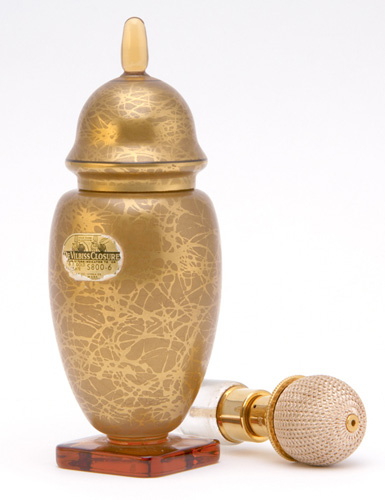 Appraisal: DEVILBISS Perfume atomizer in amber glass in gilded finish with