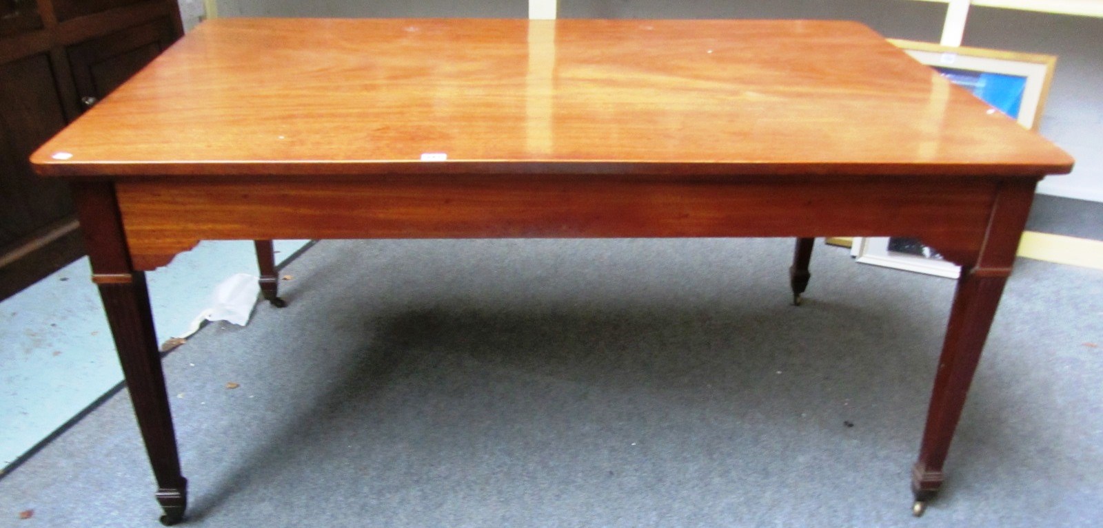 Appraisal: An early th century inlaid mahogany centre table the rectangular