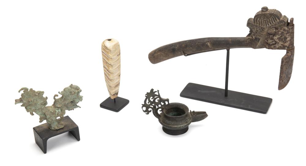 Appraisal: Four Indonesian items th Century and earlier Comprising an adze