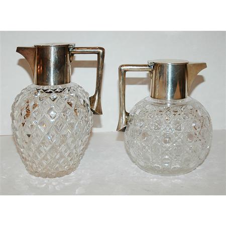 Appraisal: Two Victorian Silver Mounted Cut Glass Claret Jugs Estimate -