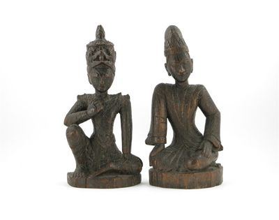 Appraisal: A pair of Burmese carved wood figures of a prince