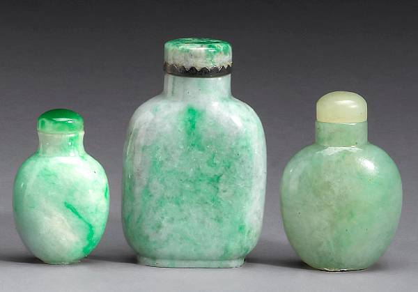 Appraisal: Three jadeite snuff bottles th Century The first of compressed