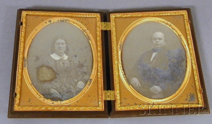 Appraisal: Molded Union Cased Daguerreotype Double Photographic Portraits of Mr and