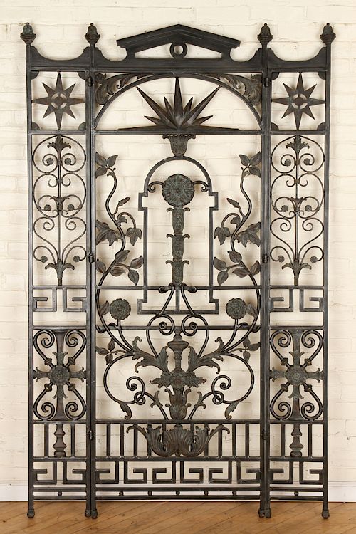 Appraisal: CAST IRON PATINATED BRASS HINGED GARDEN PANEL A cast iron