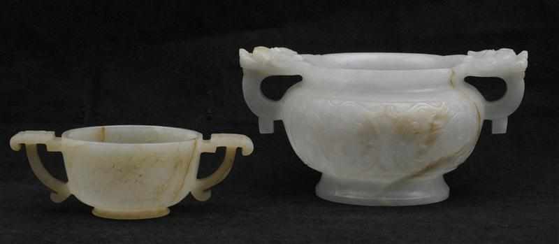 Appraisal: TWO CHINESE CARVED PALE GREEN JADE BOWLS The larger with