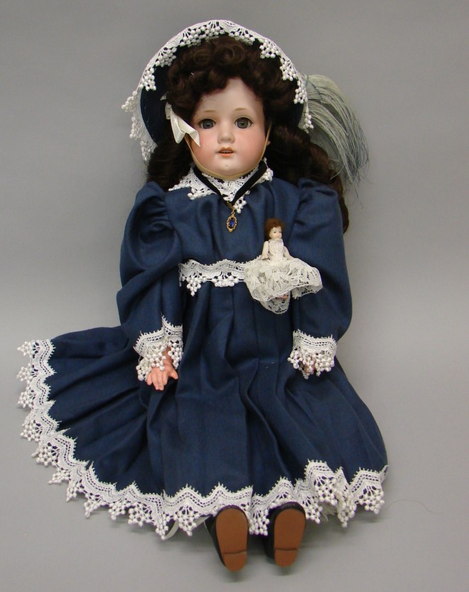 Appraisal: Armand Marseille A M Made in Germany shoulderhead doll Blue