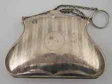 Appraisal: A silver purse with suspensory ring and leather divisions Birmingham