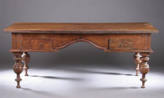 Appraisal: MONUMENTAL ANGLO-INDIAN TEAK WRITING TABLE Late th century Projecting three-board