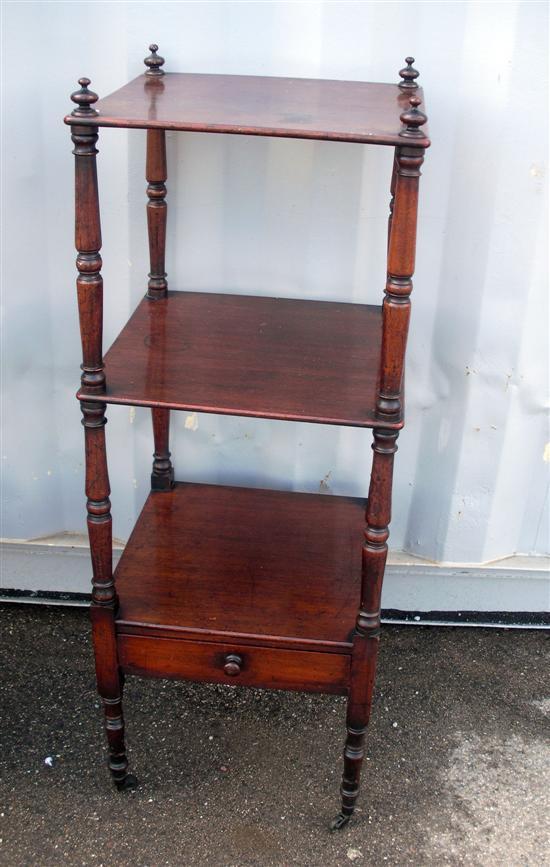 Appraisal: A th century mahogany three tier whatnot on turned supports