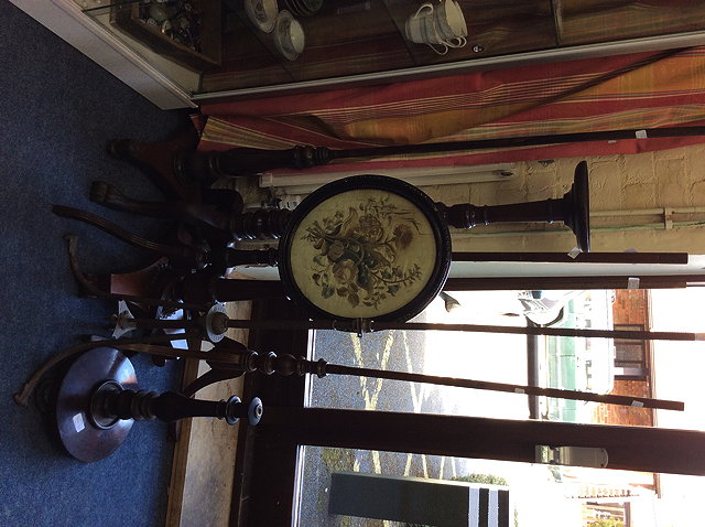 Appraisal: A VICTORIAN BRASS POLE SCREEN STAND with tripod base together