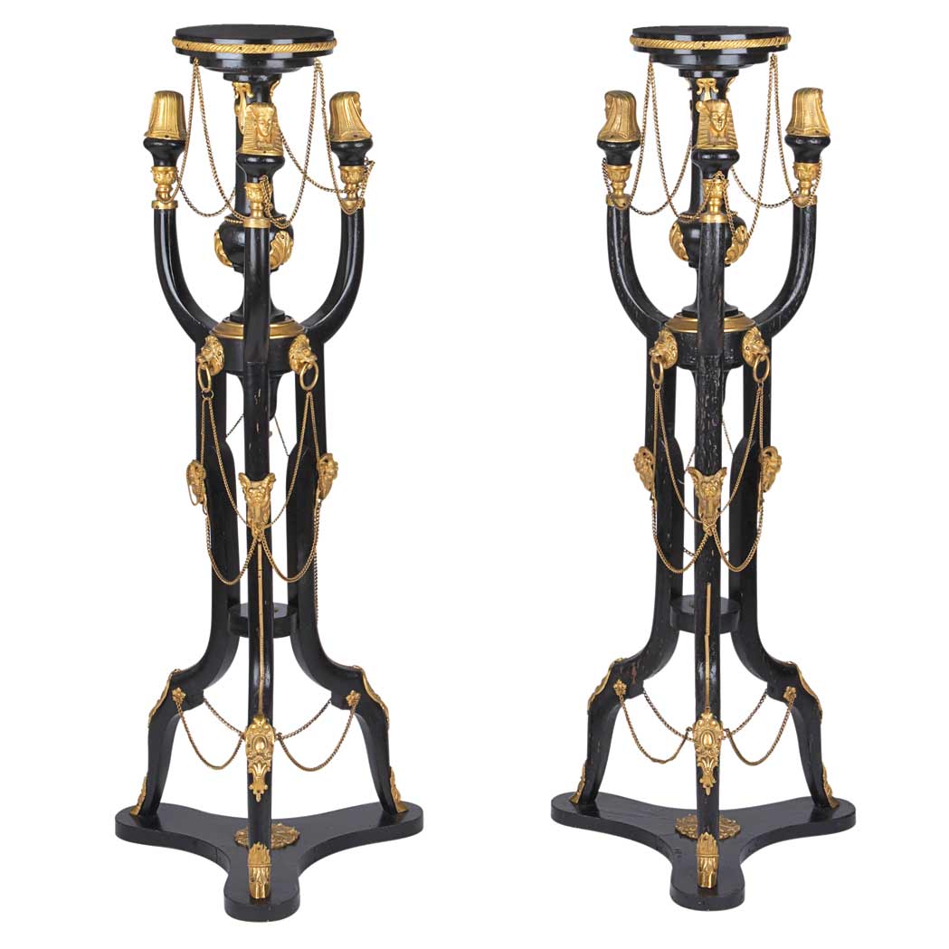 Appraisal: Pair of Empire Style Gilt-Metal Mounted Ebonized Tripod Pedestals Each