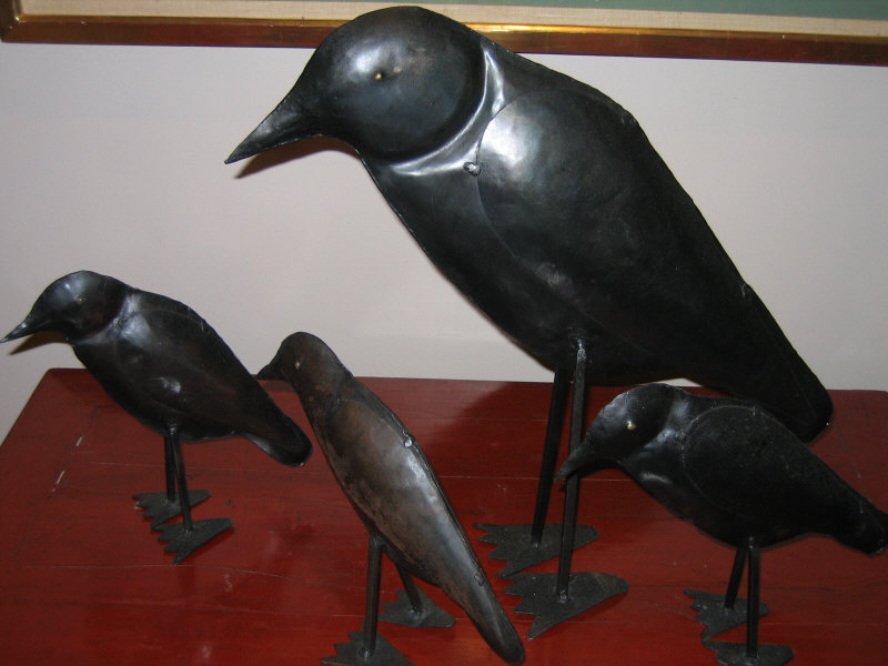 Appraisal: FOUR SHEET METAL INDIAN CROWS h - Estimate -