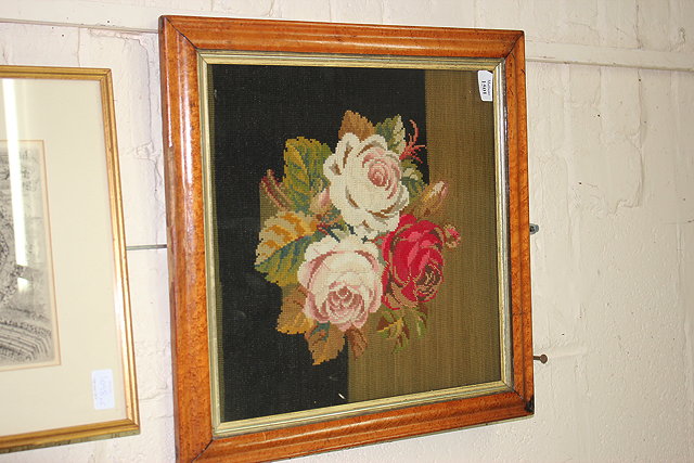 Appraisal: A NEEDLEWORK PANEL showing a bunch of three roses cm