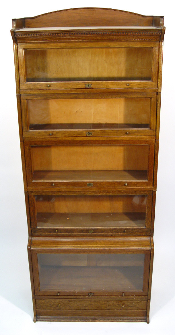 Appraisal: s Lebus five section oak bookcase the dental moulded cornice