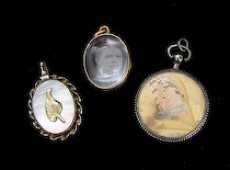 Appraisal: Three Fancy Victorian Photograph Lockets ca late th early th