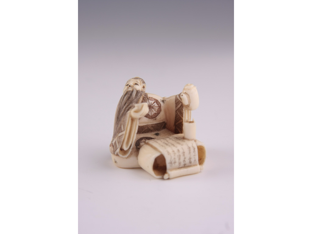 Appraisal: Netsuke Katabori Ivory scholar engaged in pouring tea while his