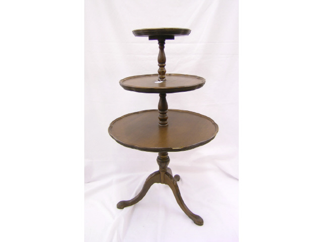 Appraisal: Three-tier pie-crust tea table chip on bottom tier chippendale style