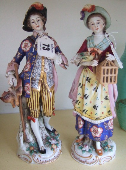 Appraisal: A pair of Sampson porcelain figures a gentleman in th