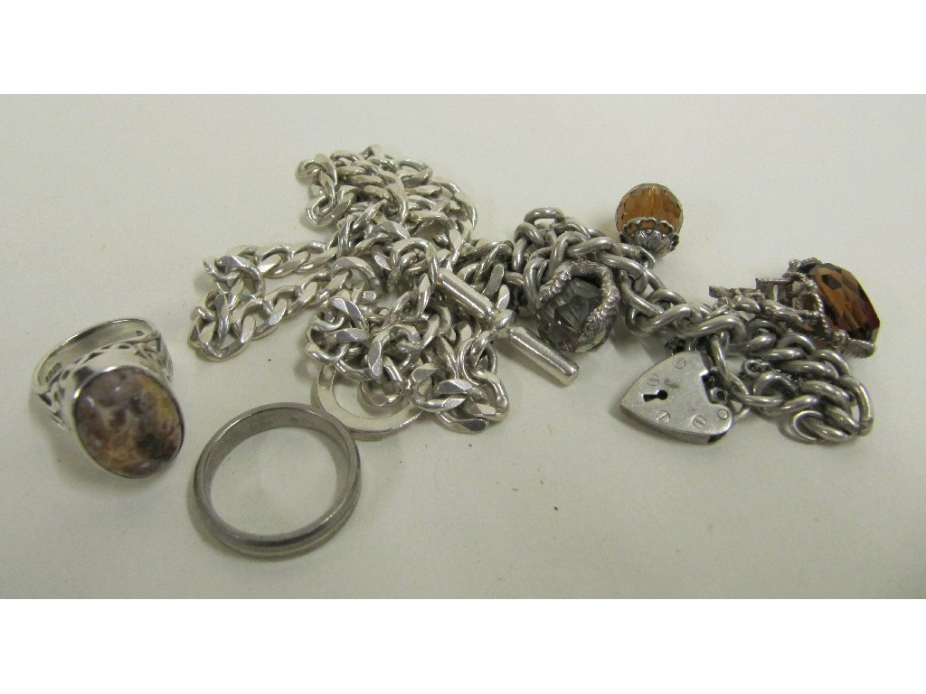 Appraisal: Lot comprising silver charm bracelet silver pebble set ring a