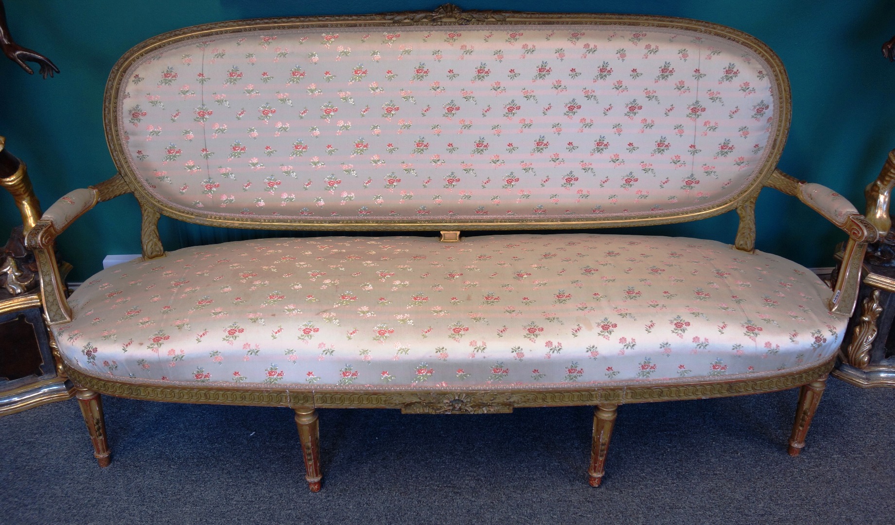 Appraisal: A Louis XVI style gilt framed sofa on tapering fluted