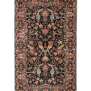 Appraisal: A Sino-Persian Wool Rug Second Half th Century feet inch