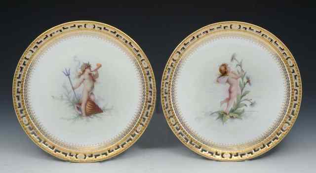 Appraisal: A PAIR OF MINTON PORCELAIN CABINET PLATES each painted by