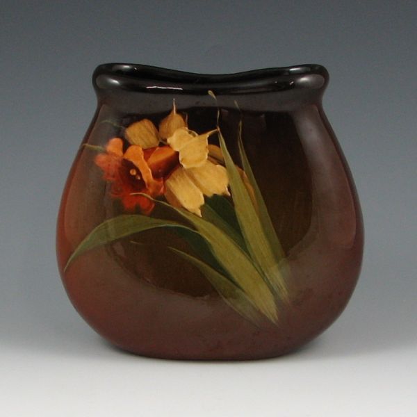 Appraisal: Standard glaze pillow vase with daffodil decoration Unmarked Excellent condition