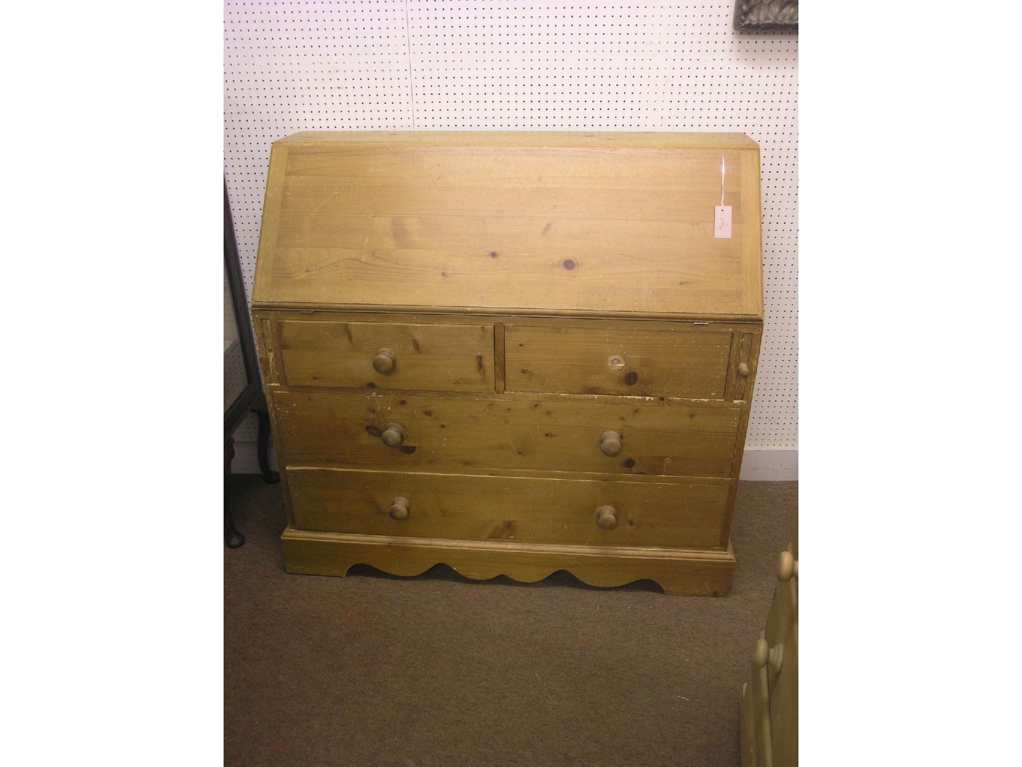 Appraisal: A waxed pine bureau stepped interior with central cupboard two