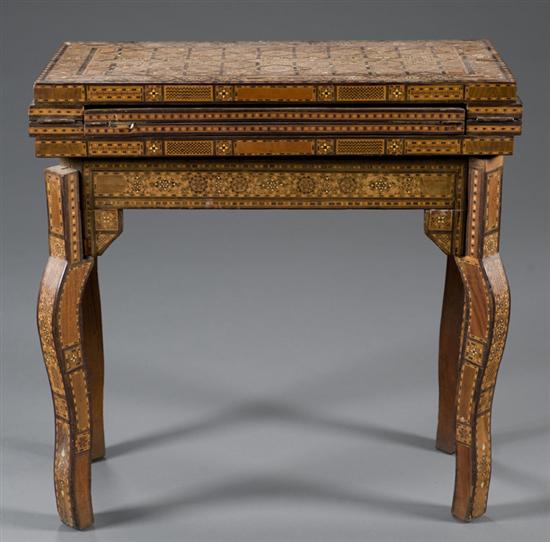 Appraisal: Levantine inlaid game table Early th century Lavishly inlaid with