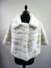 Appraisal: A white mink evening cape with clasp and white satin