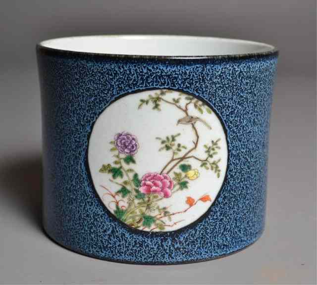 Appraisal: Chinese Four-panelled Brush PotCircular brush pot with four enamelled panels