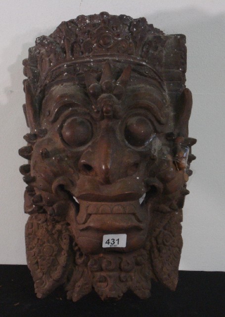 Appraisal: Indonesian Mask together with Indonesian Monkey Blow Dart carved wood