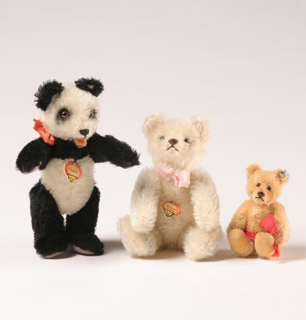 Appraisal: Three vintage Steiff bears Panda and two teddies two with