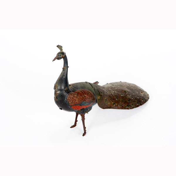 Appraisal: German tin litho peacock wind up toy Marked 'bavaria' long