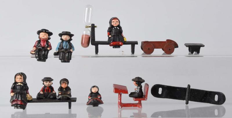 Appraisal: Cast Iron Assorted Amish Figure Novelties Includes Egg Timer Children