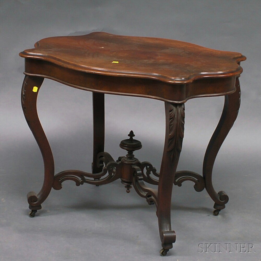 Appraisal: Victorian Walnut Occasional Table late th century the serpentine-shaped top