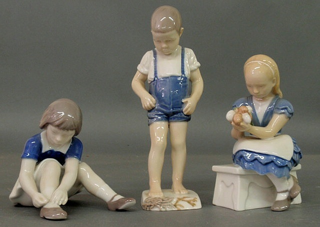 Appraisal: Three B G Denmark figures- boy with crab h girl