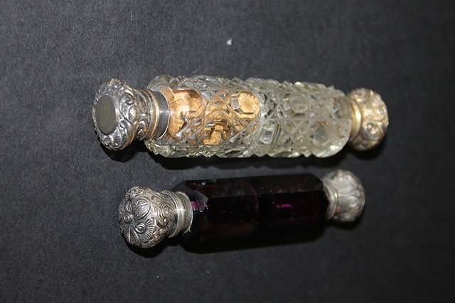 Appraisal: A VICTORIAN AMETHYST GLASS DOUBLE ENDED SCENT BOTTLE of octagonal