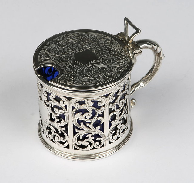 Appraisal: A GEORGE V SILVER MUSTARD POT with pierced panel of