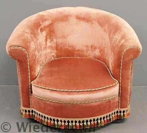 Appraisal: Pink upholstered barrel-back armchair h x w x d seat